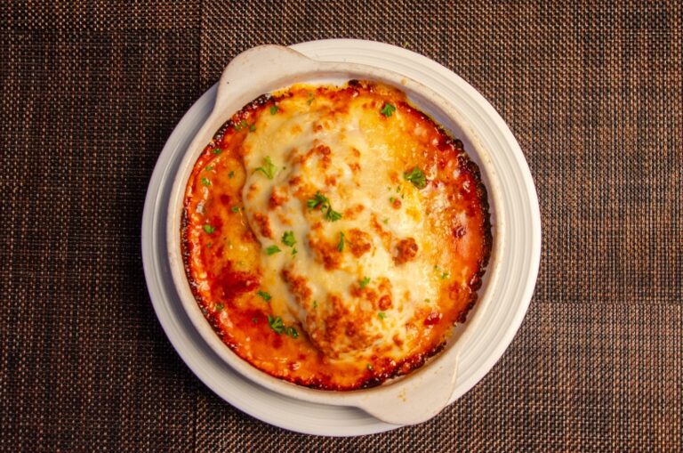 Baked cheesy pasta gratin, comfort dish at Pizza on Fire restaurant Phuket