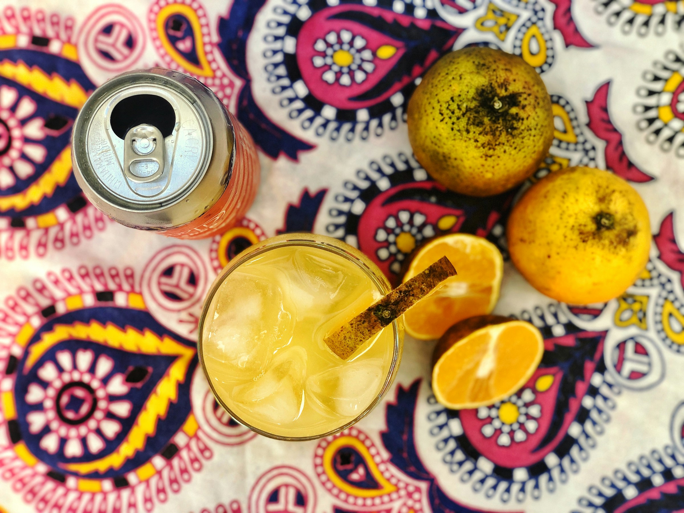 Acidic foods and drinks Citrus fruit and soda, flat lay