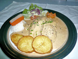 French main course in sauce with garnish, Le Celtique restaurant Phuket